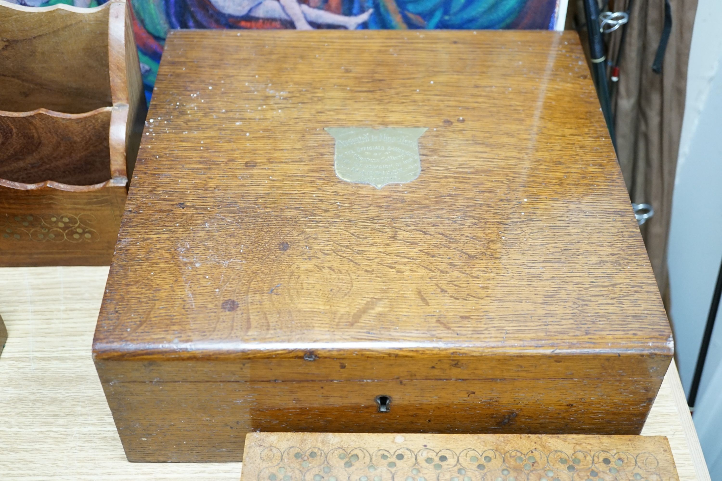 A Georgian square mahogany tea caddy, a brass inlaid hardwood stationary rack and box, and sundry items